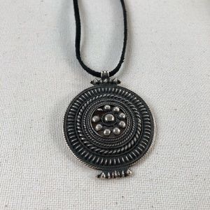 Cast base metal pendant